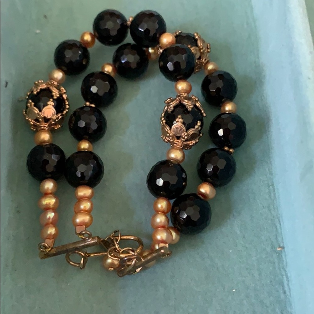 Double row black beaded bracelet.